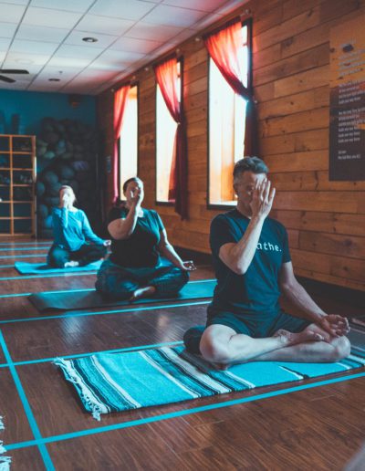 Yoga students practicing seated meditation.