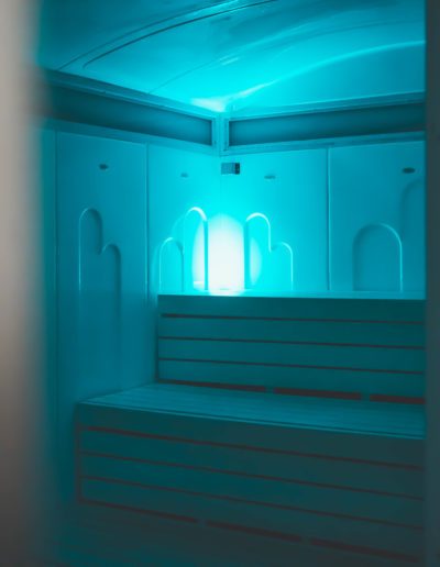 Cold plunge tub with blue lighting.