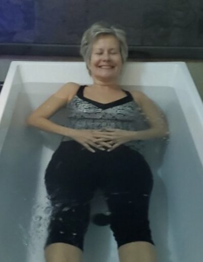 Woman enjoying a hydrotherapy session.