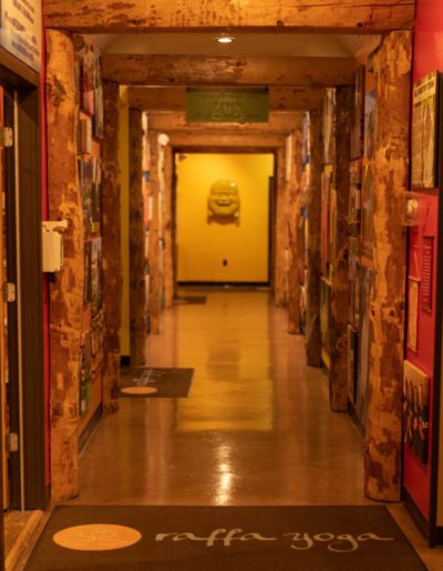 Corridor leading to Raffa yoga studio's tranquil space.