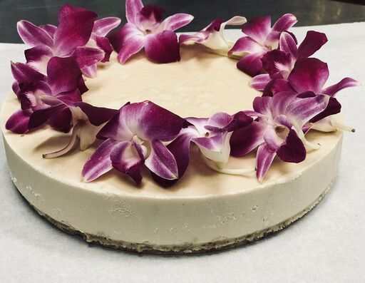 Orchid-adorned raw vegan cheesecake.