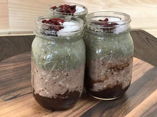 Chia pudding jars with chocolate and nuts.