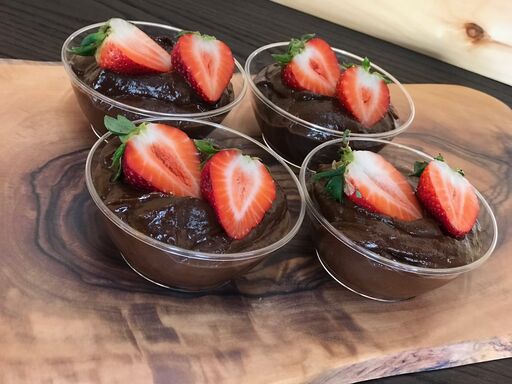 Vegan chocolate mousse with strawberries.
